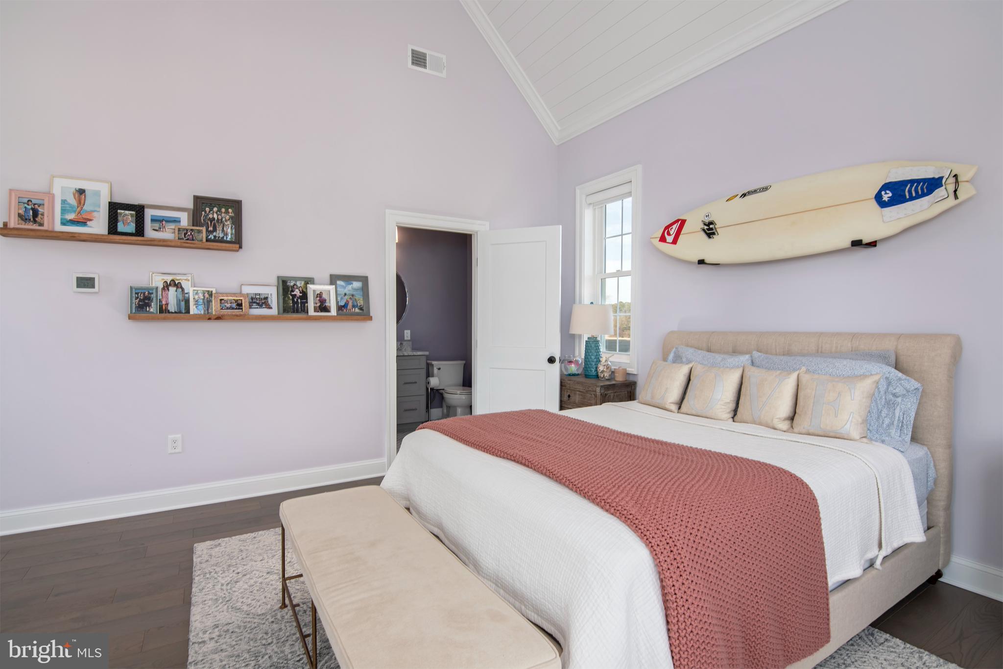 21825 Langdon Farm Road Sherwood, MD 21665 - Photo 34 of 47 a bedroom with a bed and wooden floor