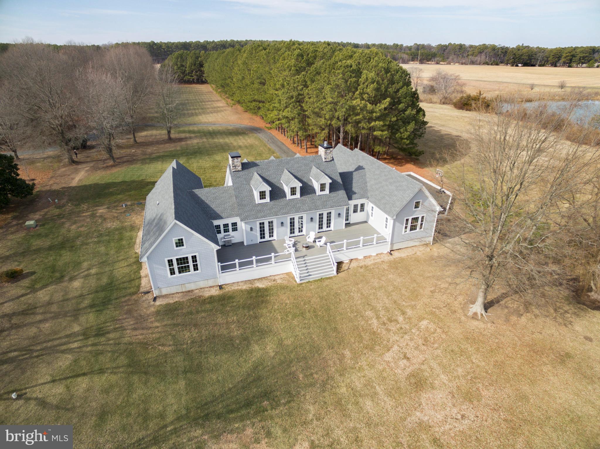 21825 Langdon Farm Road Sherwood, MD 21665 - Photo 4 of 47 a view of a house with a lake view