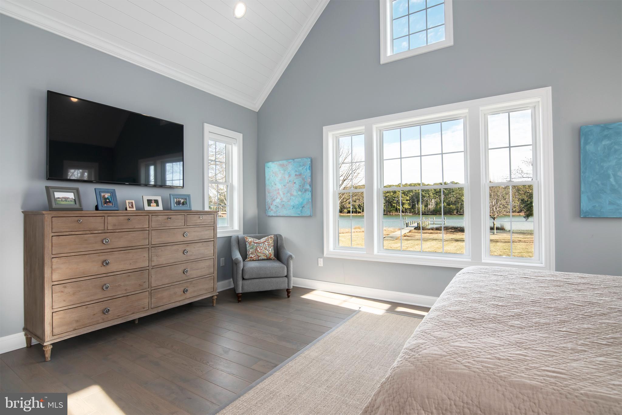 21825 Langdon Farm Road Sherwood, MD 21665 - Photo 42 of 47 a bedroom with a bed and flat screen tv