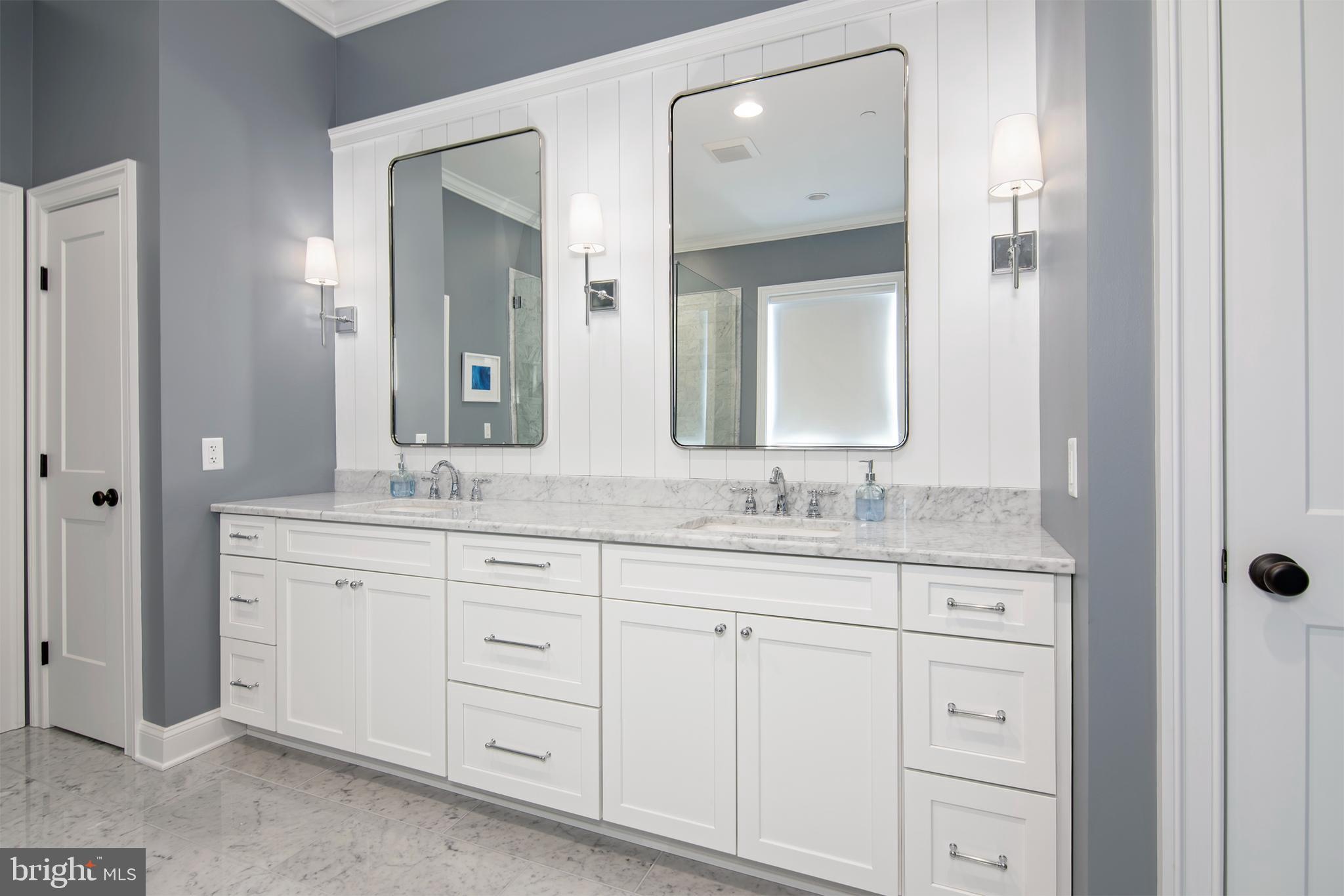 21825 Langdon Farm Road Sherwood, MD 21665 - Photo 43 of 47 a bathroom with a granite countertop sink vanity and mirror