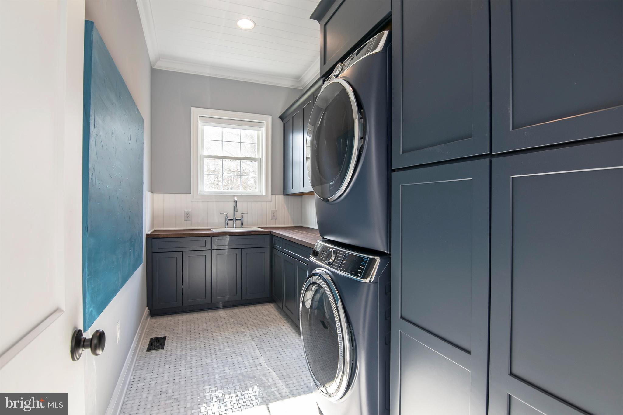 21825 Langdon Farm Road Sherwood, MD 21665 - Photo 47 of 47 a utility room with sink dryer and washer