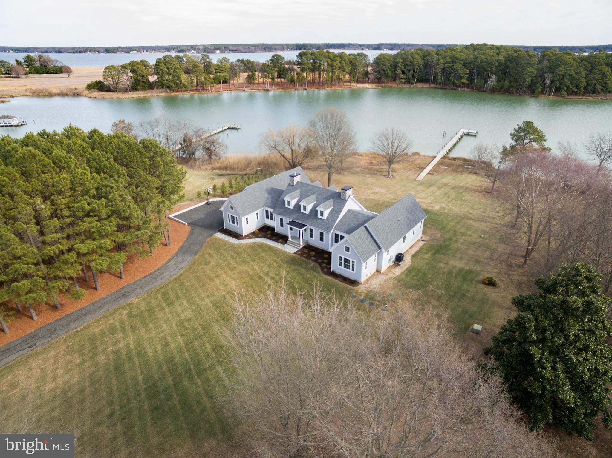 21825 Langdon Farm Road Sherwood, MD 21665 - Photo 5 of 47 an aerial view of a house with a lake view