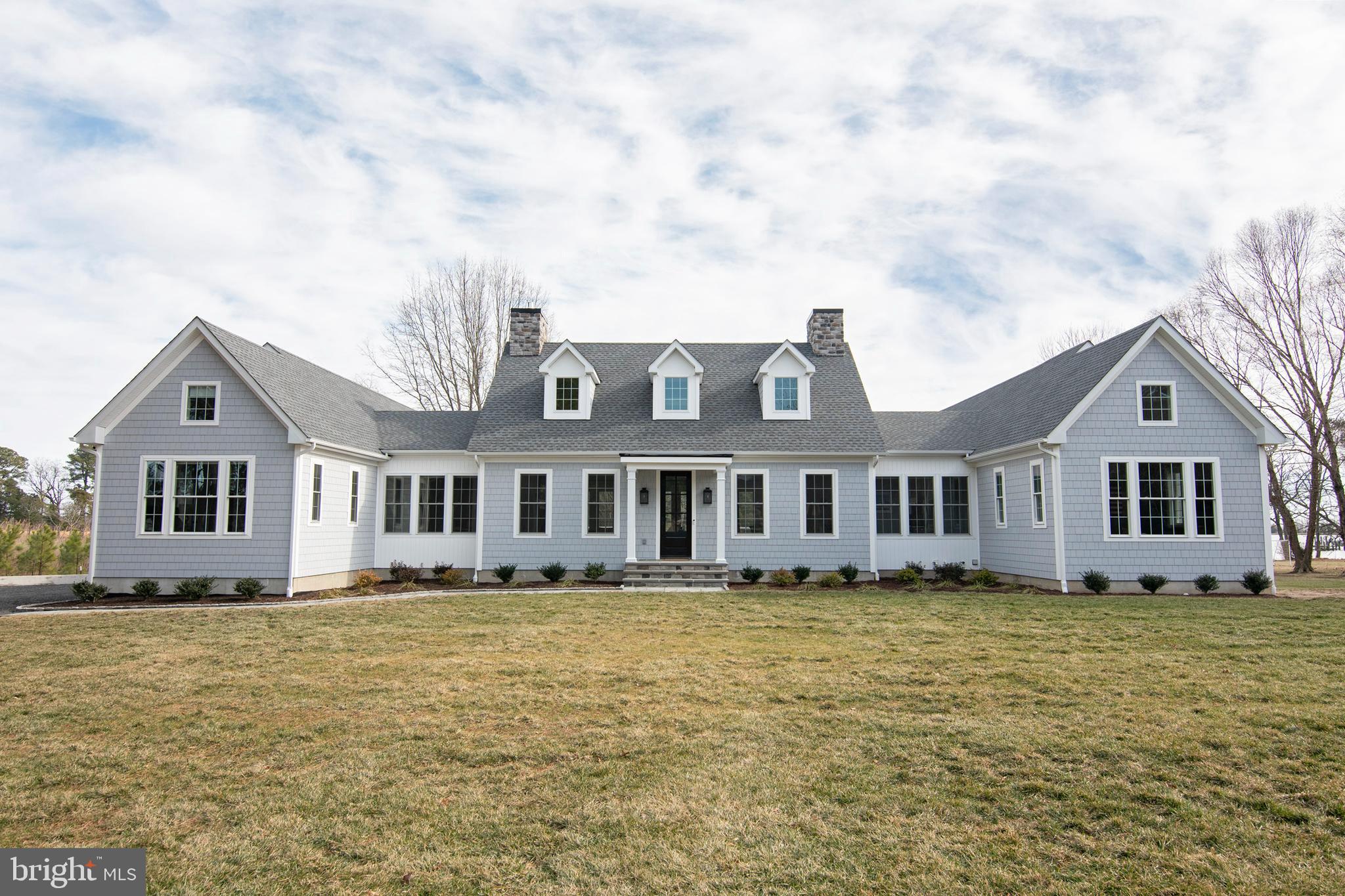 21825 Langdon Farm Road Sherwood, MD 21665 - Photo 6 of 47 a front view of a house with garden
