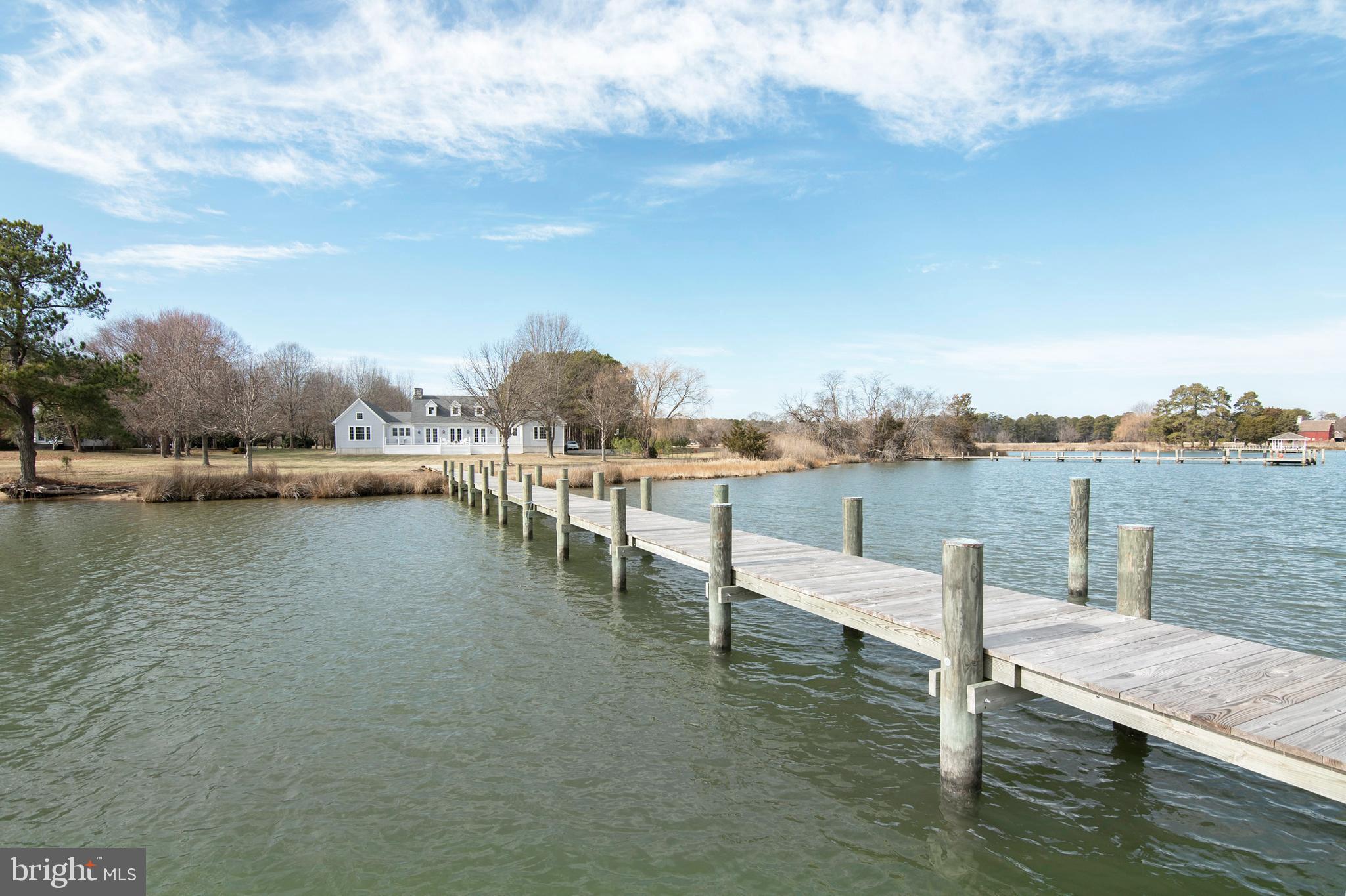 21825 Langdon Farm Road Sherwood, MD 21665 - Photo 10 of 47 a view of a lake with houses in the back