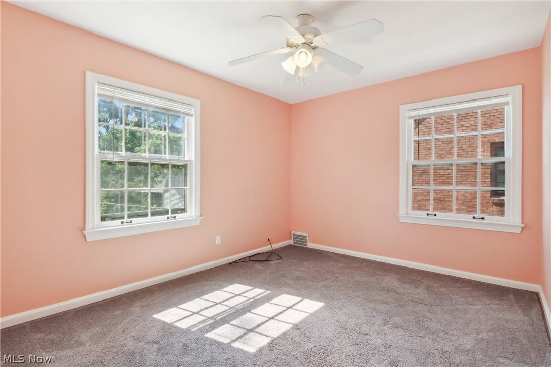 2620 Charney Road Cleveland, OH 44118 - Photo 23 of 43 Carpeted spare room with ceiling fan
