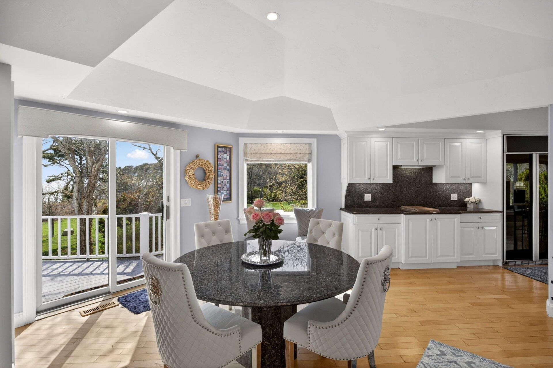 461 Wings Neck Road Pocasset, MA 02559 - Photo 19 of 42 a view of a dining room with furniture window and outside view