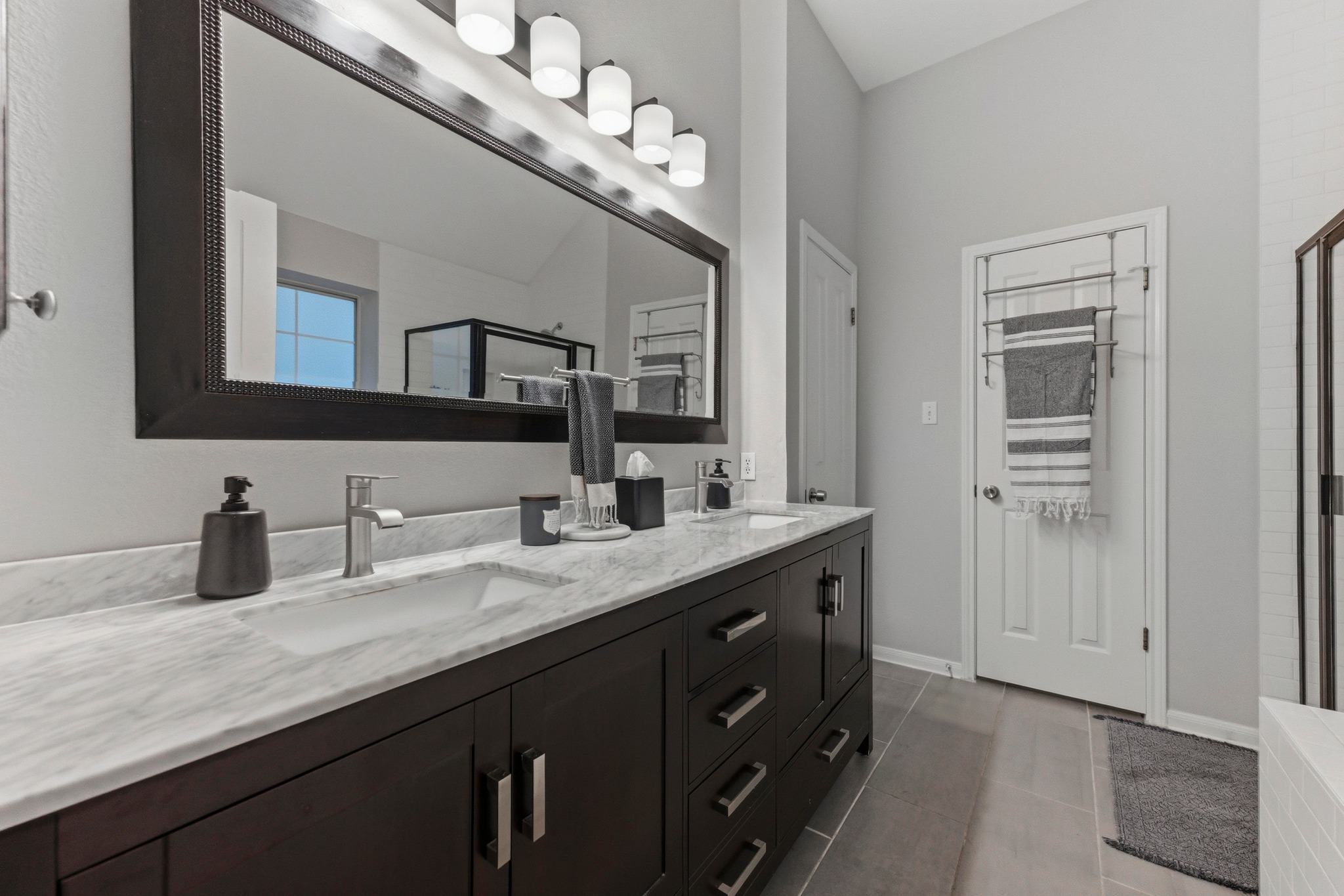 6925 Auckland Drive Austin, TX 78749 - Photo 16 of 29 Clean lines and modern finishes create a spa-inspired space designed for comfort and ease.