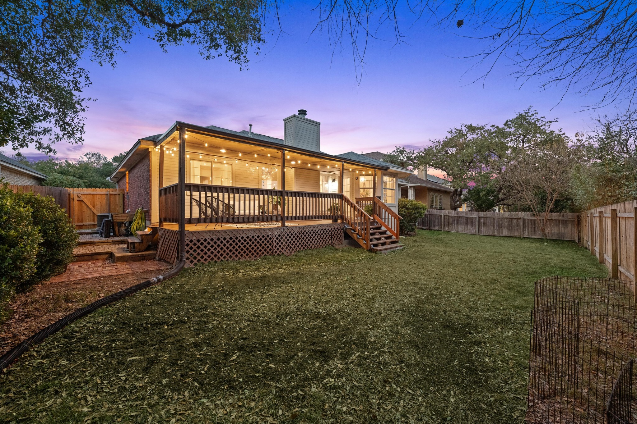 6925 Auckland Drive Austin, TX 78749 - Photo 26 of 29 Ample space for play, gardening, and entertaining.