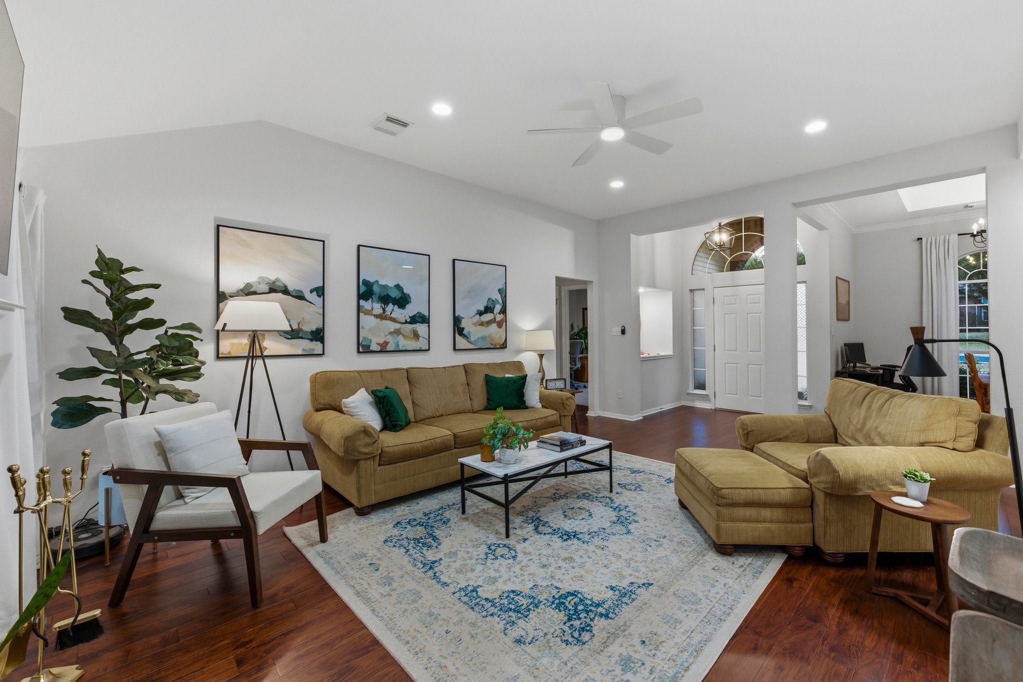 6925 Auckland Drive Austin, TX 78749 - Photo 6 of 29 Engineered acacia wood floors add warmth and continuity throughout the living areas.
