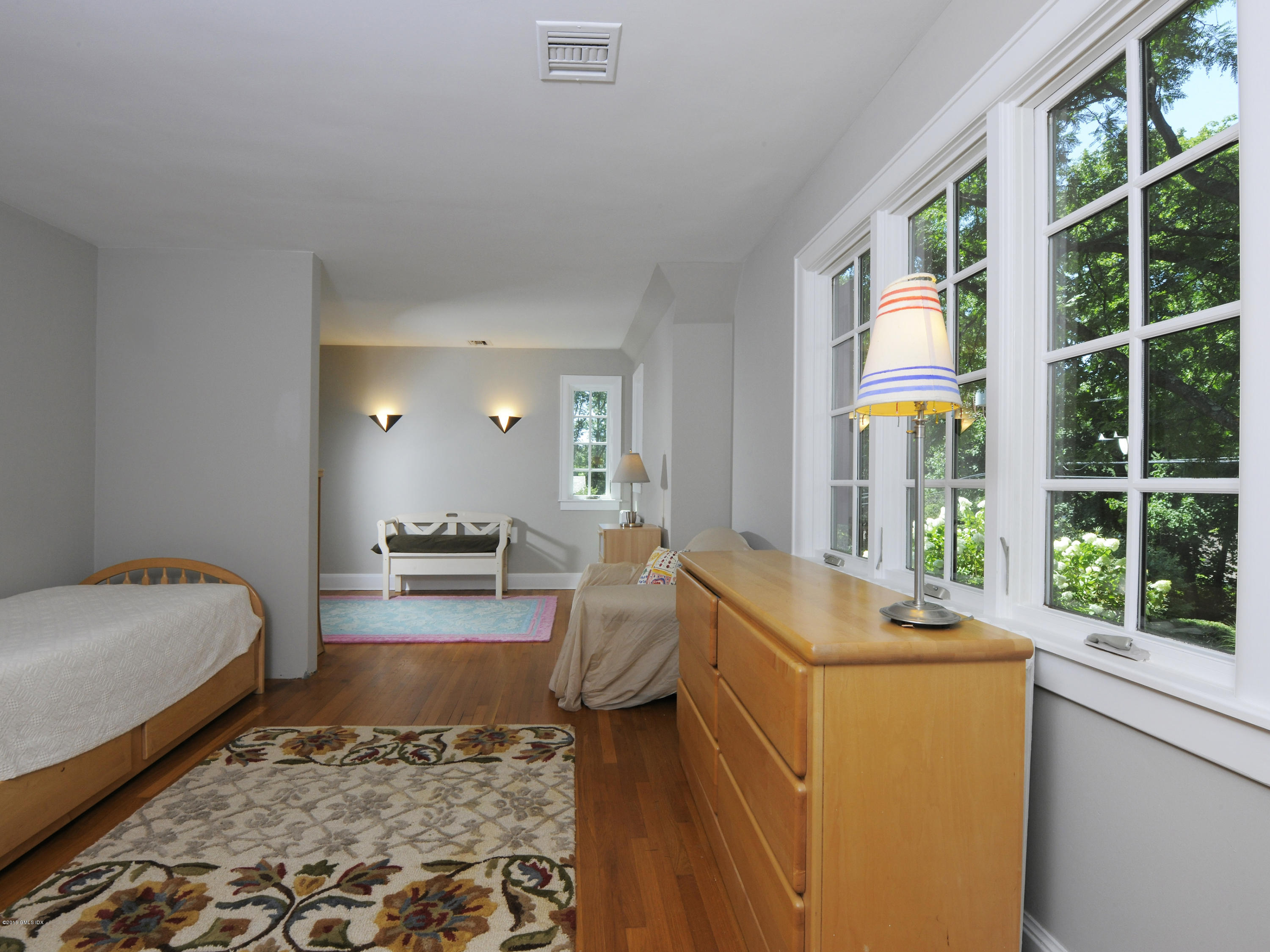 65 Overlook Drive Greenwich, CT 06830 - Photo 15 of 21 a bedroom with furniture and a window