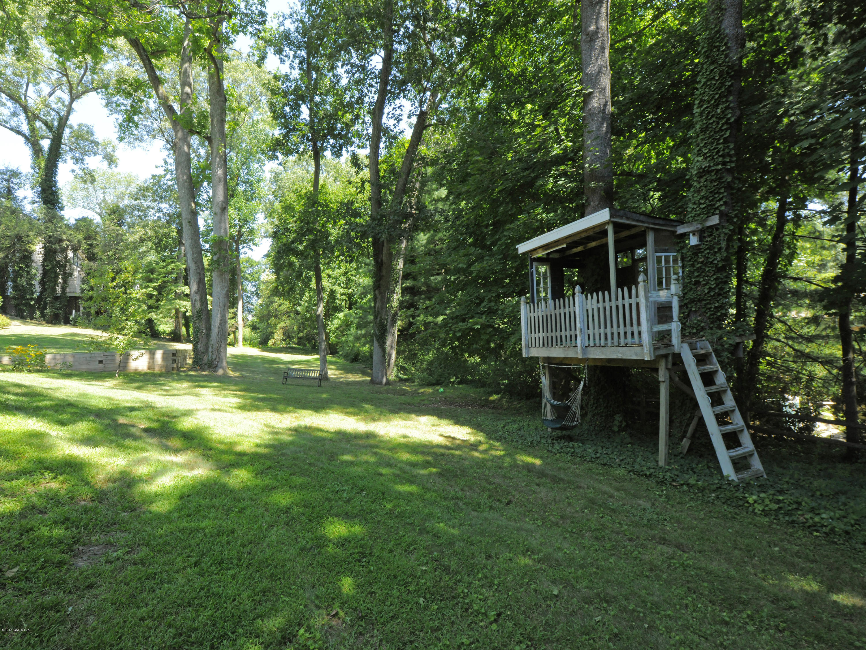 65 Overlook Drive Greenwich, CT 06830 - Photo 20 of 21 a green field with lots of trees in it