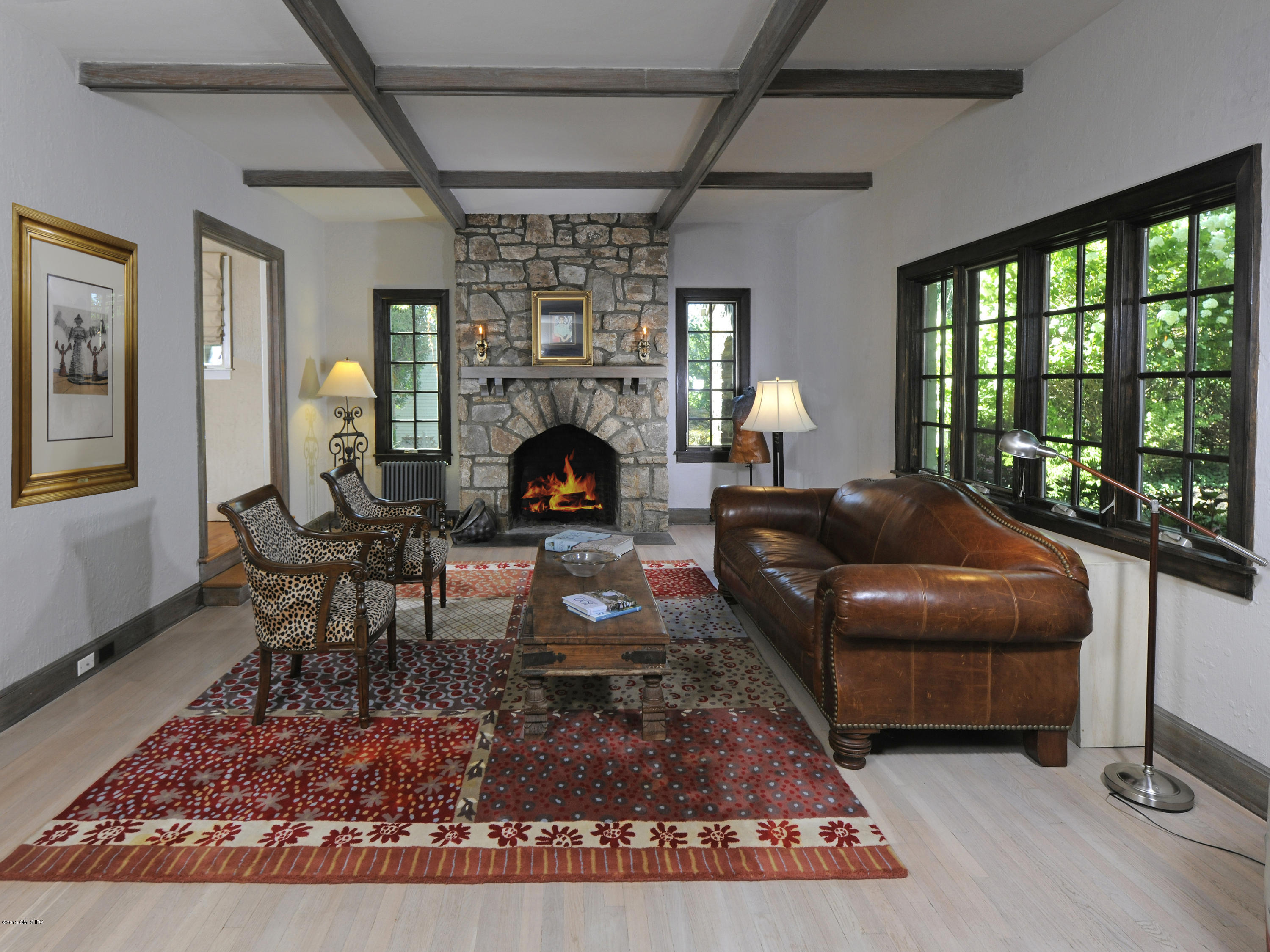 65 Overlook Drive Greenwich, CT 06830 - Photo 5 of 21 a living room with furniture and a fireplace