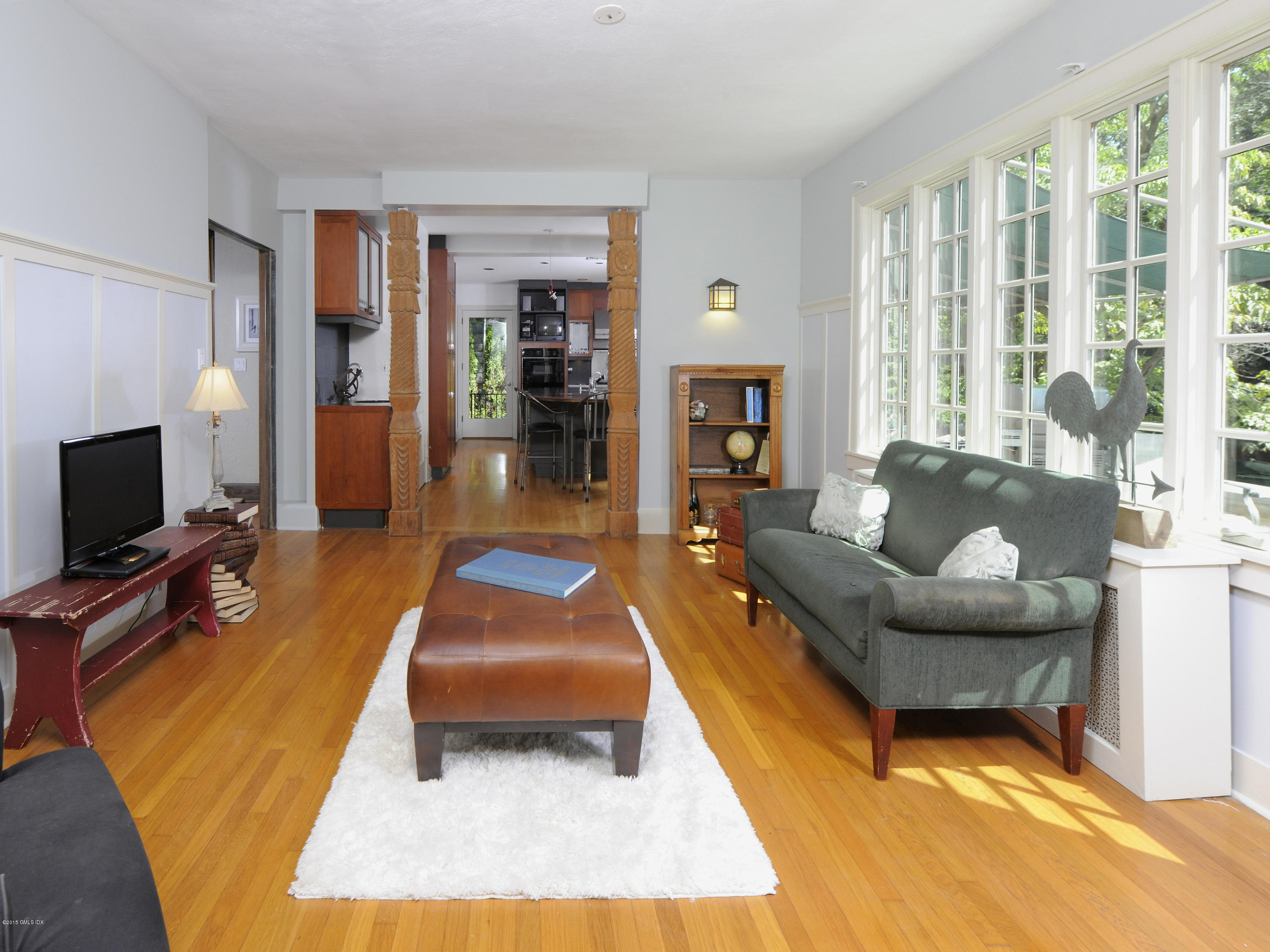 65 Overlook Drive Greenwich, CT 06830 - Photo 8 of 21 a living room with furniture and a flat screen tv