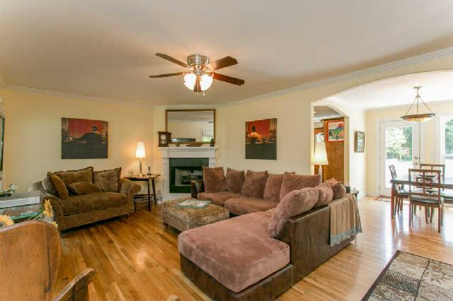 2670 Cooks Road Mount Juliet, TN 37122 - Photo 20 of 20 a living room with furniture a fireplace and a flat screen tv