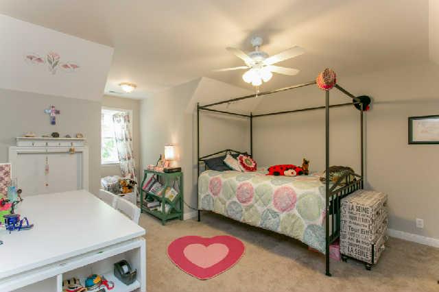 2670 Cooks Road Mount Juliet, TN 37122 - Photo 12 of 20 a bedroom with a bed and a chandelier