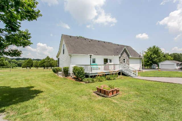 2670 Cooks Road Mount Juliet, TN 37122 - Photo 16 of 20 a view of a house with a yard and sitting area