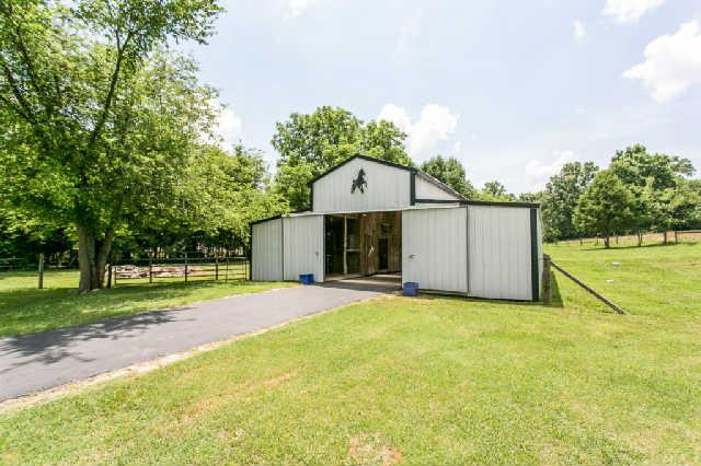 2670 Cooks Road Mount Juliet, TN 37122 - Photo 18 of 20 a view of a house with a big yard and large trees