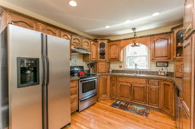 2670 Cooks Road Mount Juliet, TN 37122 - Photo 7 of 20 a kitchen with stainless steel appliances granite countertop a refrigerator and a sink