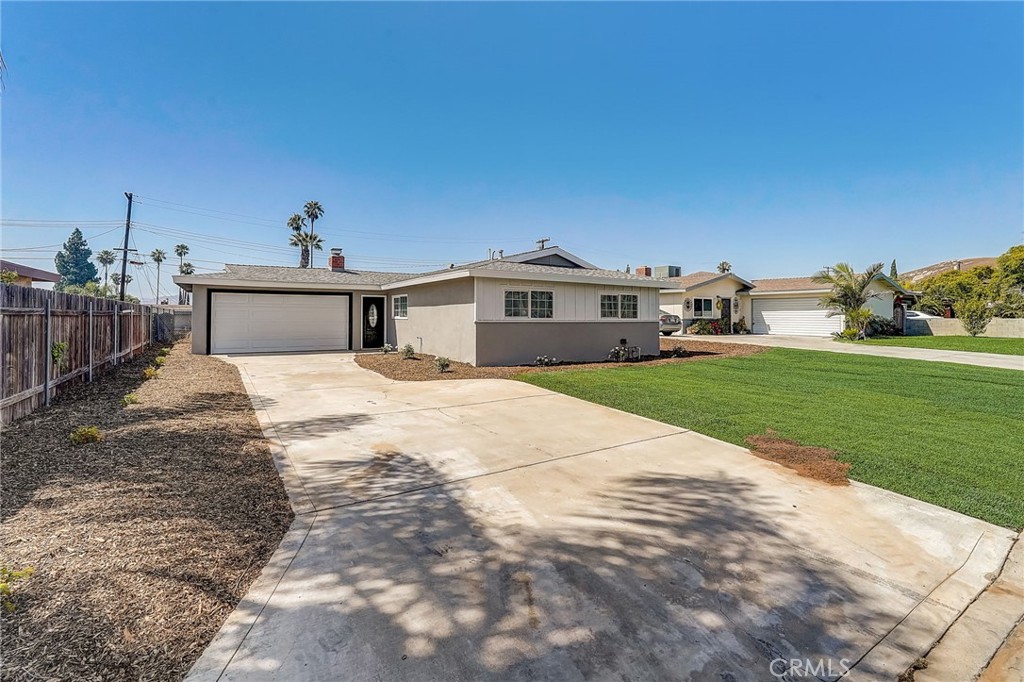 11124 Blue Jay Drive Riverside, CA 92505 - Photo 1 of 16 a view of a house with a yard and sitting area
