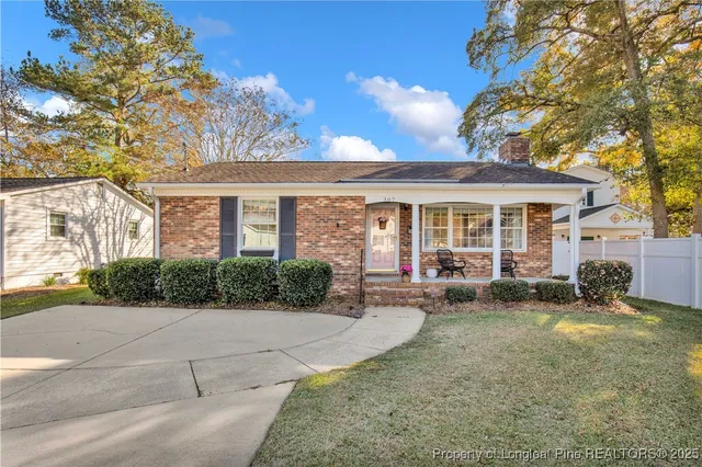 front view of a house with a patio