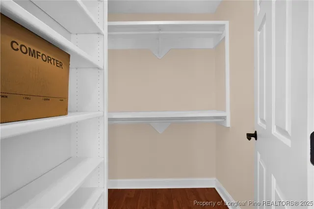 a view of small space with racks on the wall