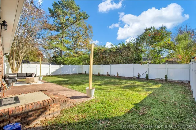 a view of a playground with basketball court