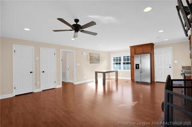 a view of kitchen with cabinets and wooden floor