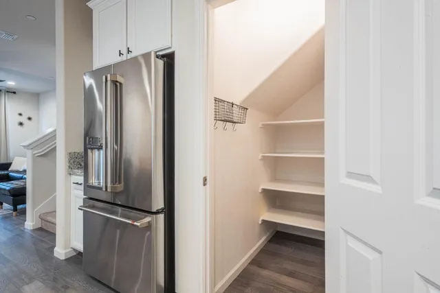 a bathroom with a sink a mirror and toilet
