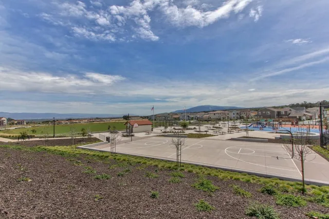 a view of a street with a building in the background