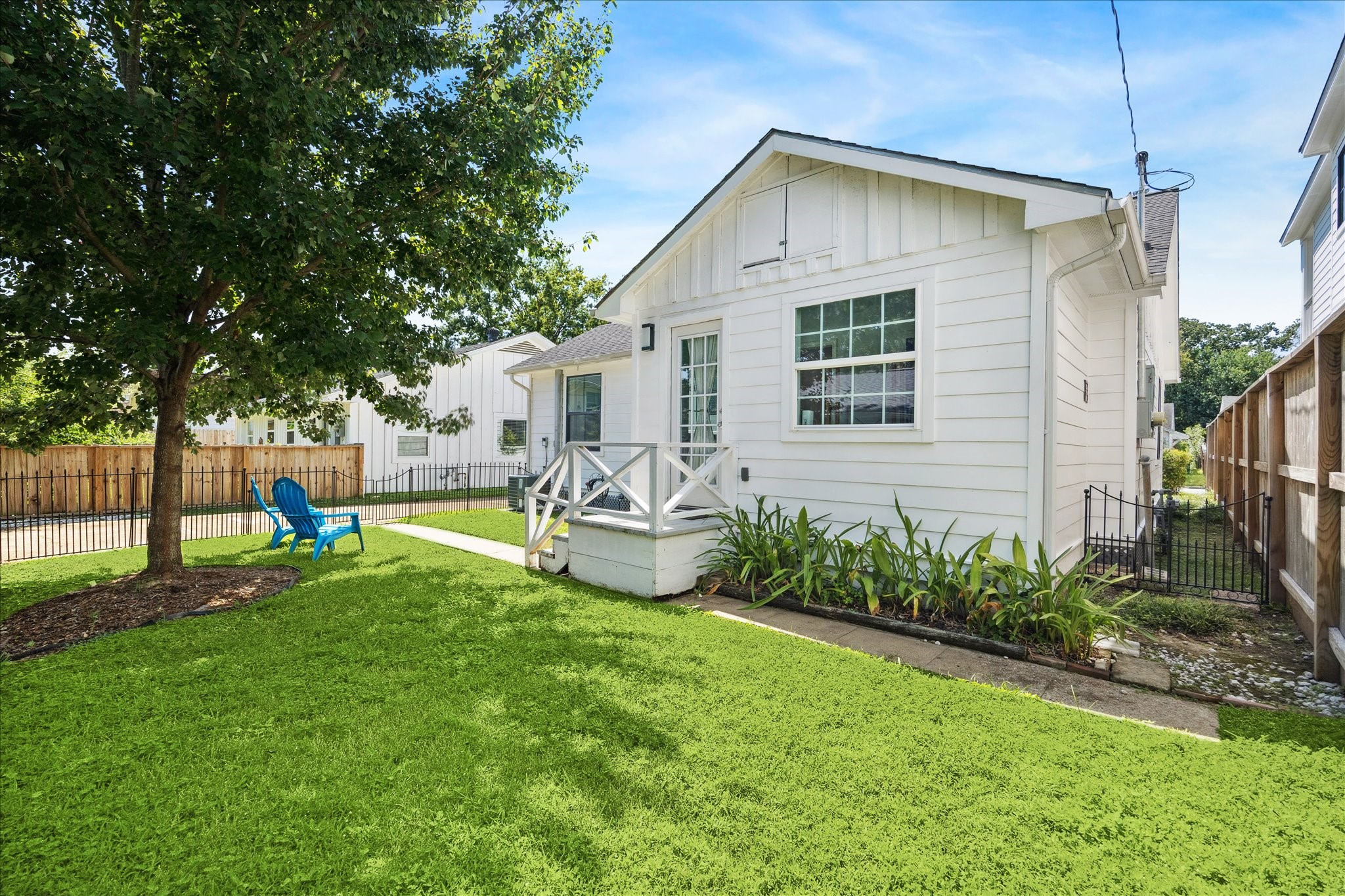 4710 Edison Street Houston, TX 77009 - Photo 12 of 18 a front view of a house with garden