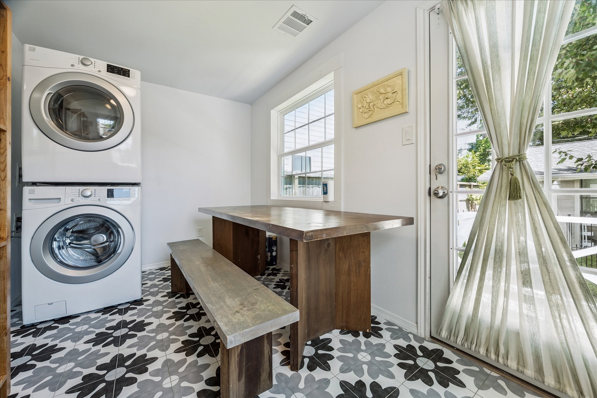 4710 Edison Street Houston, TX 77009 - Photo 10 of 18 a view of a storage and utility room with washer and dryer