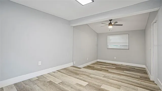a view of a room with a white walls