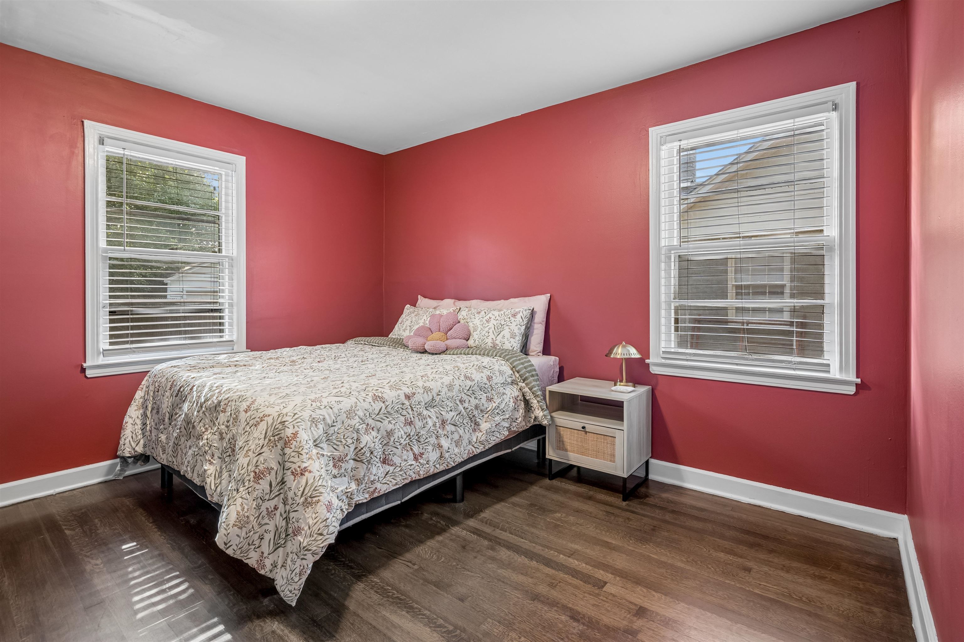 706 North Perkins Road Memphis, TN 38122 - Photo 14 of 20 Hardwood flooring, painted walls, two windows with white trim, and a ceiling with recessed lighting