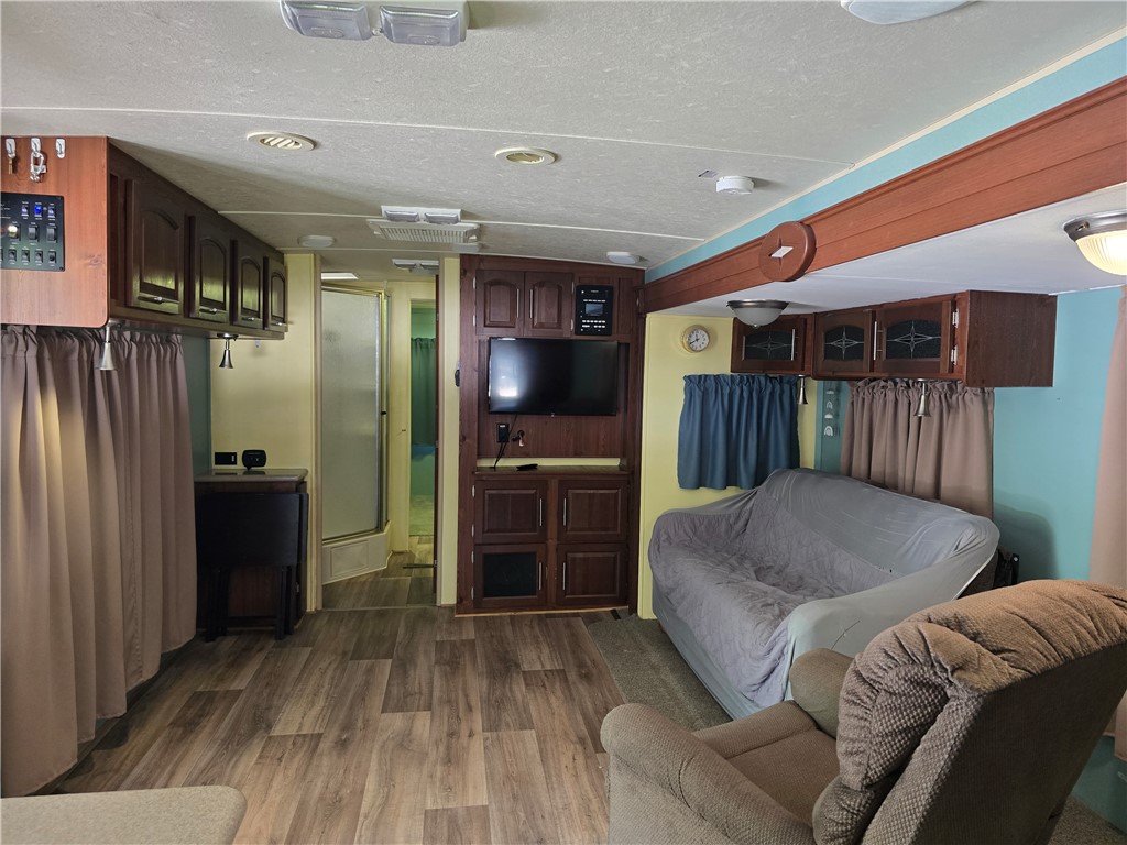 131 Loop Circle Westminster, SC 29693 - Photo 5 of 17 This cozy living area features durable flooring and ample storage solutions for comfortable living.