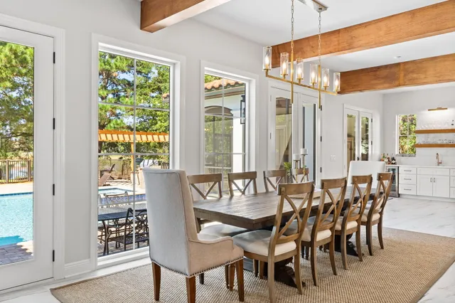 a kitchen with stainless steel appliances a stove microwave and cabinets