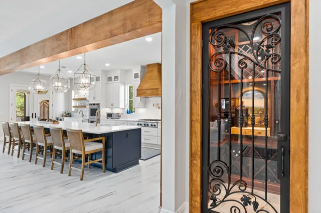 a bed room with a bed and a chair