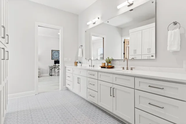 a view of a golf course with a lake view