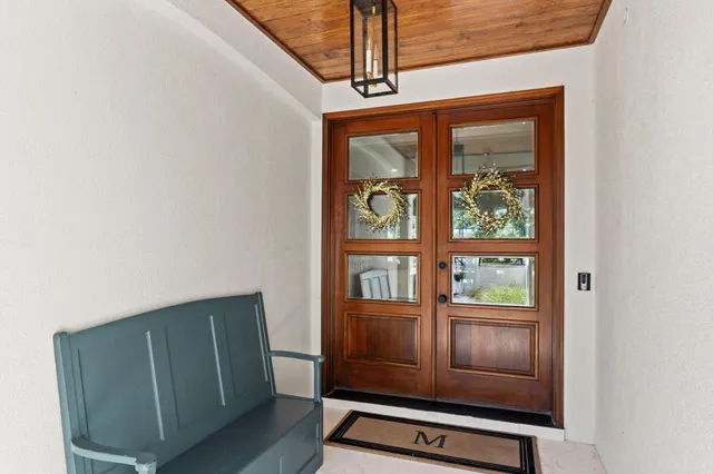 a living room with fireplace furniture and a flat screen tv