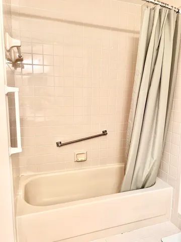 a bathroom with a bathtub