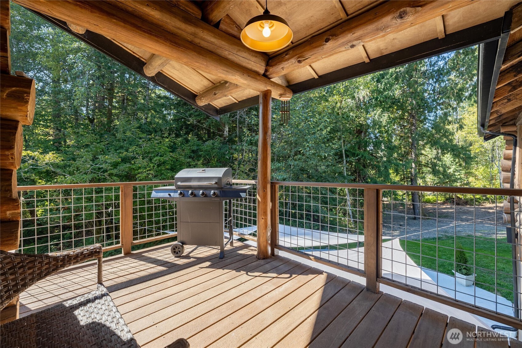 7577 Canyon View Drive Deming, WA 98244 - Photo 13 of 40 a view of a balcony with wooden floor