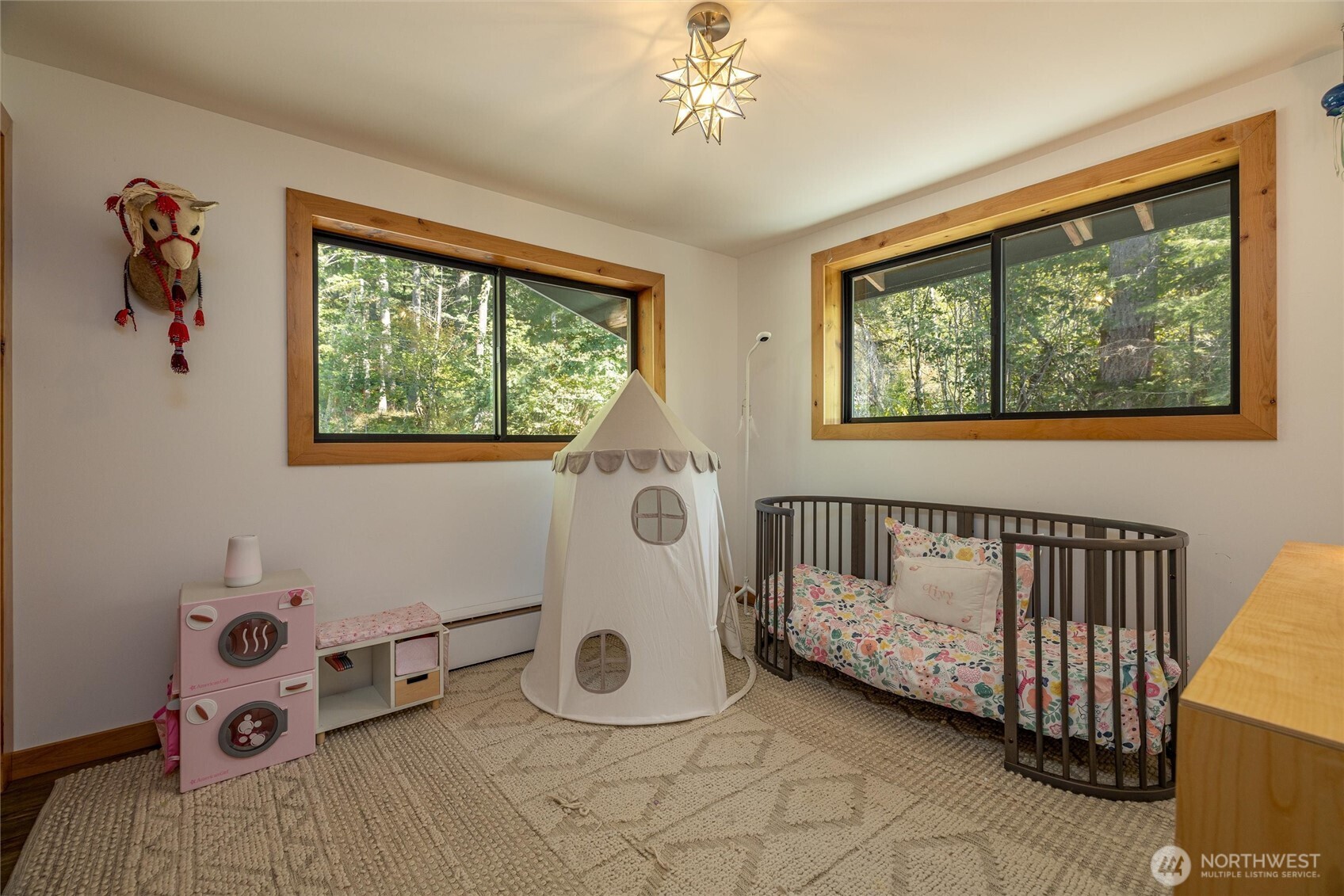 7577 Canyon View Drive Deming, WA 98244 - Photo 14 of 40 a bedroom with a bed and a window