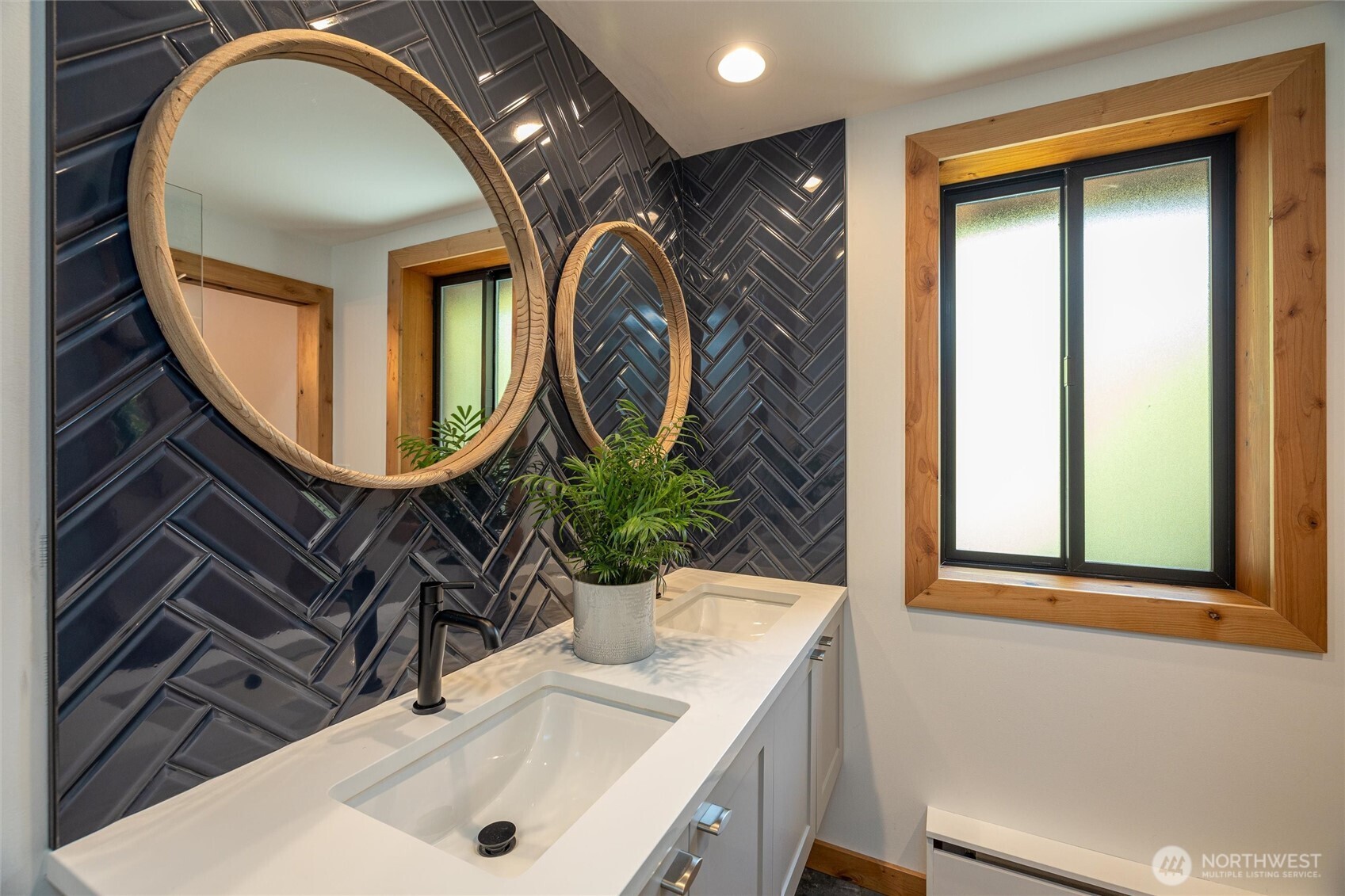 7577 Canyon View Drive Deming, WA 98244 - Photo 21 of 40 a bathroom with a sink and a mirror