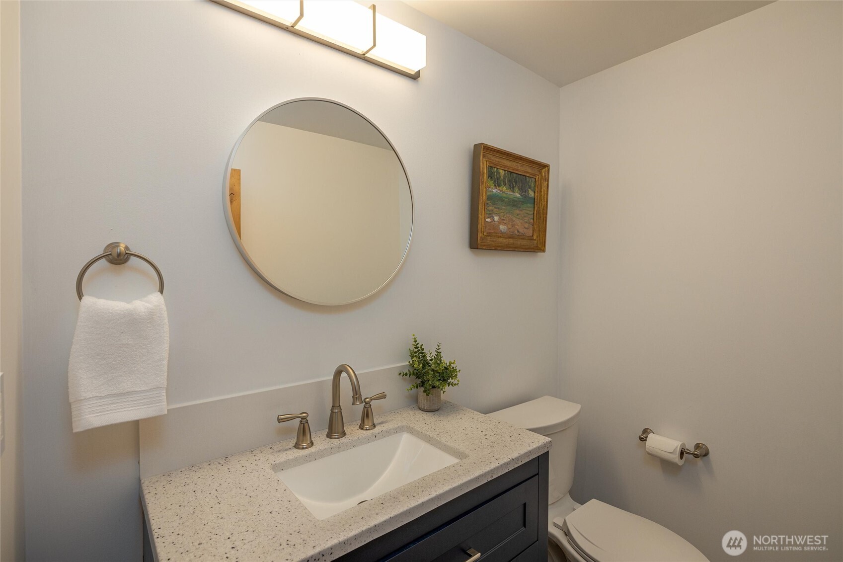7577 Canyon View Drive Deming, WA 98244 - Photo 26 of 40 a bathroom with a sink vanity mirror and toilet