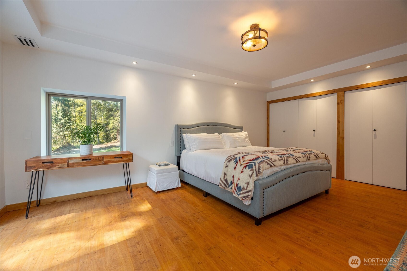 7577 Canyon View Drive Deming, WA 98244 - Photo 29 of 40 a bedroom with a bed and window