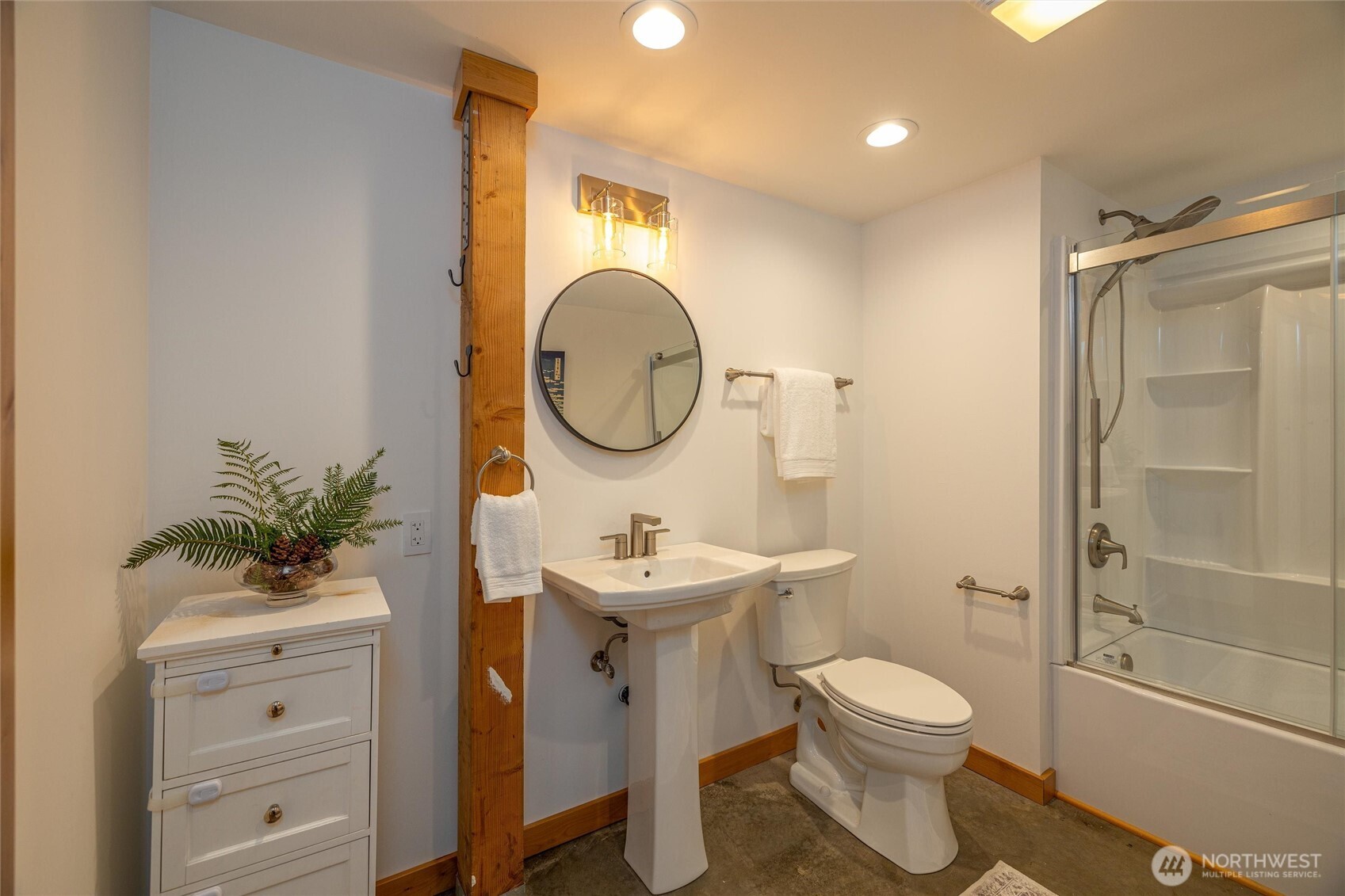 7577 Canyon View Drive Deming, WA 98244 - Photo 31 of 40 a bathroom with a toilet a sink and a mirror
