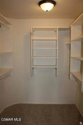 a view of small space with racks on the wall