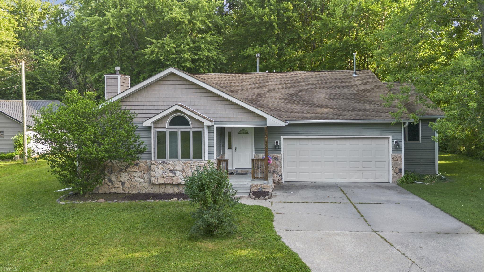 6580 Swartout Road Algonac, MI 48001 - Photo 2 of 34 50214348-b276ef5b-4bfd-453b-850c-d034290bd602.JPG