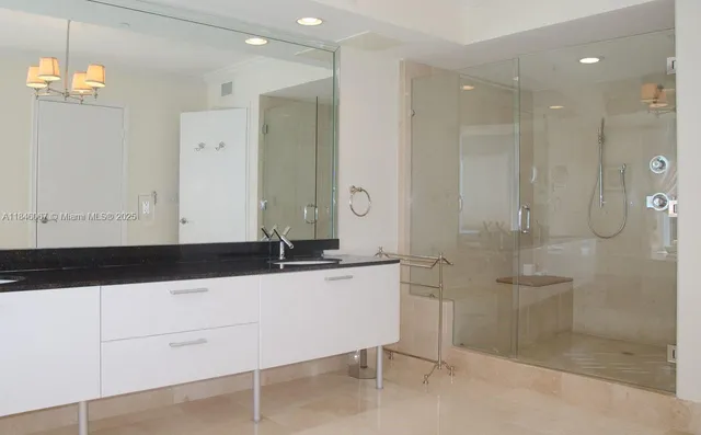 a bathroom with a shower and a toilet