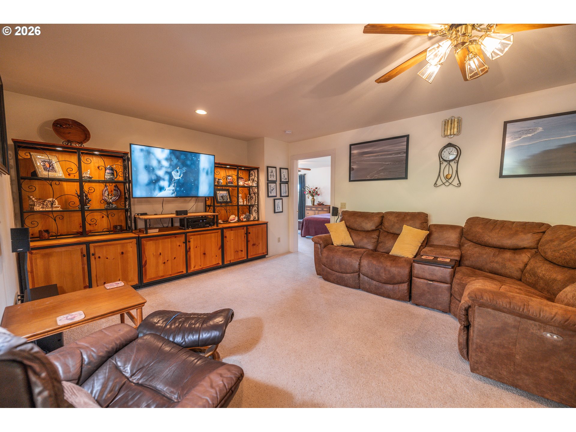 489 Fir Vista Road Sutherlin, OR 97479 - Photo 12 of 47 a living room with furniture and a flat screen tv