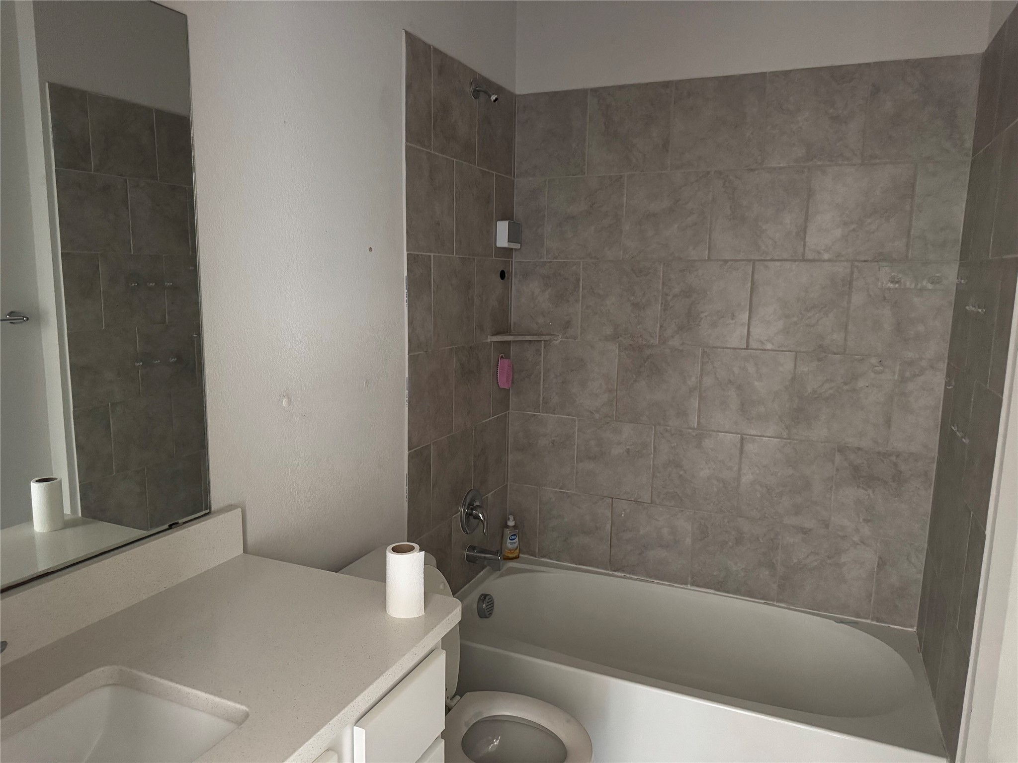 333 Capstone Road Liberty Hill, TX 78642 - Photo 6 of 40 Bathroom with vanity and shower / washtub combination